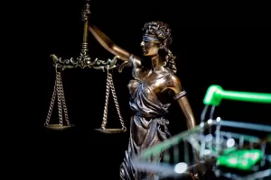 Photo of Lady Justice representing the consumer protection law outline prepared by Schlanger Law Group to empower consumers