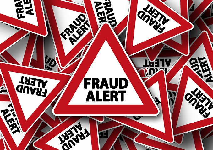 photo of several warning signs for Fraud Alert depicting the New Jersey Consumer Fraud Act and how Schlanger Law Group helps protect consumers