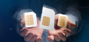 Photo of hands juggling three SIM cards depicting a SIM Swap situation when Schlanger Law Group may be able to help victims.
