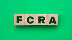 Photo of 4 Scrabble tiles spelling FCRA depicting the Fair Credit Reporting Act issues that Schlanger Law Group helps consumers resolve