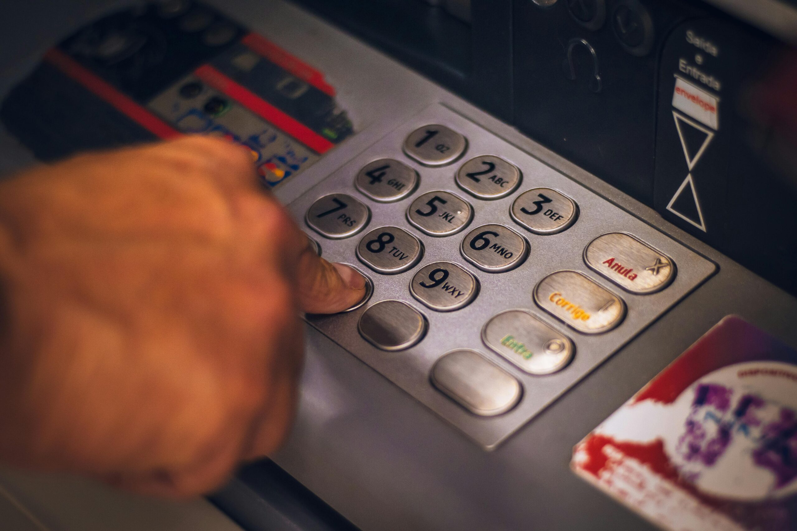 criminal draining bank account with stolen identity